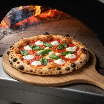 Authentic Neapolitan pizza with fresh basil and buffalo mozzarella in a wood-fired oven